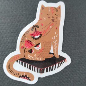 Orange cat on a pillow sticker